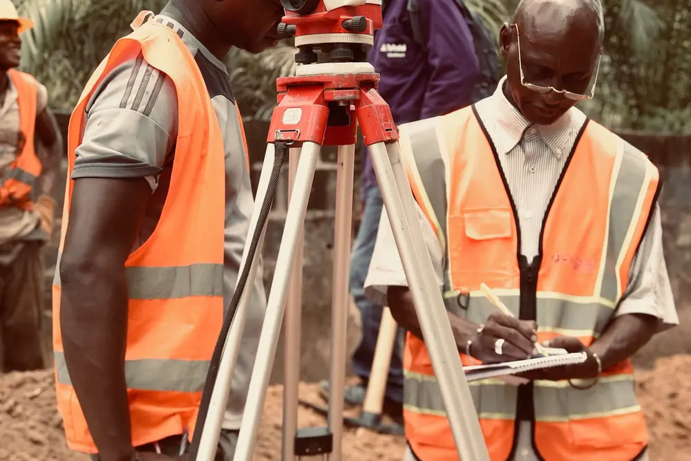 Hydrotech engineers setting out levels on site in The Gambia